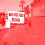 Un cartello indica "Bank owned homes sold here"